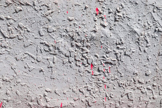 Wallpaper mural featuring a dry concrete texture, perfect for decorating a room.