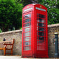 Wallpaper mural featuring a scene with red phone booths, perfect for decorating your home.