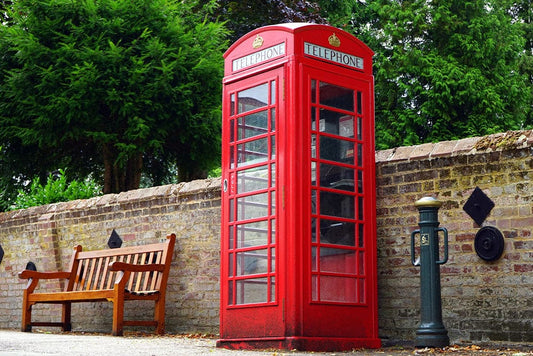 Wallpaper mural featuring a scene with red phone booths, perfect for decorating your home.