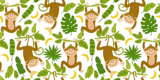 a wall mural with monkeys, leaves, and fruit