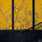 a pomegranate tree and a bird on a yellow background are featured in this handcrafted classic hallway wallpaper mural.
