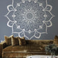 a fascinating white pattern on a gray backdrop is featured in this custom-made wallpaper mural for the living room.