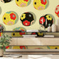 Wallpaper mural with colourful embroidery balls for use as decoration in