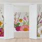 Wallpaper mural with colorful flowers blooming on the floor for use in home decoration
