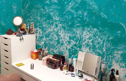 Wallpaper mural of a crystal clear sea for the decor of the powder room