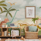 Wallpaper mural featuring a gathering of dinosaurs for use as nursery decor.