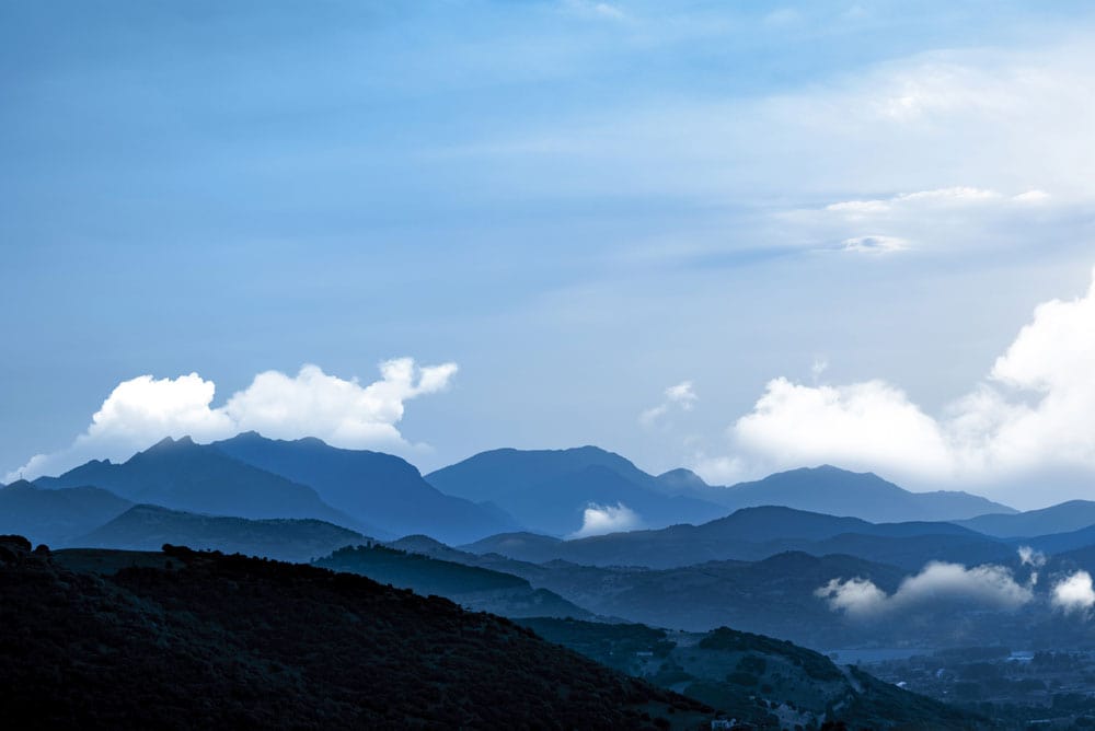 Wallpaper mural with shifting mountain ranges, perfect for use as home decor.