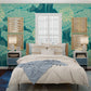 Wallpaper mural in a fluorescent turquoise lotus pattern for the bedroom's decor.