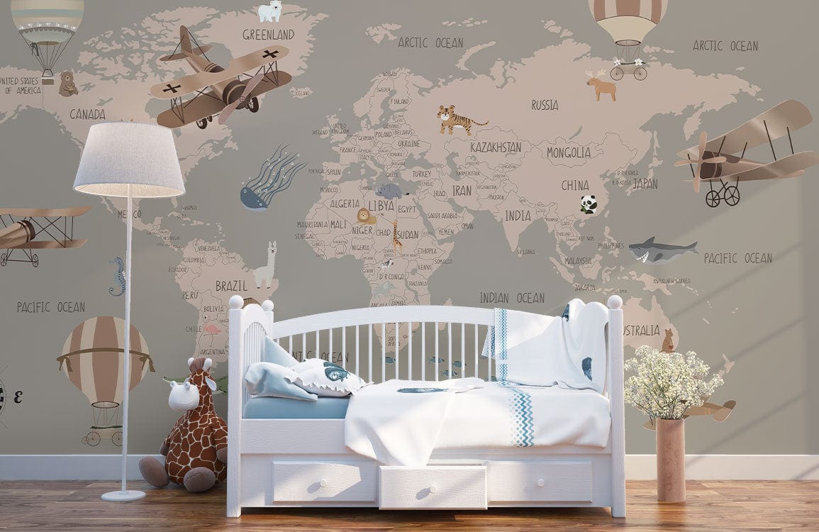 Wallpaper mural for the nursery decorated in gray and pink featuring a map.
