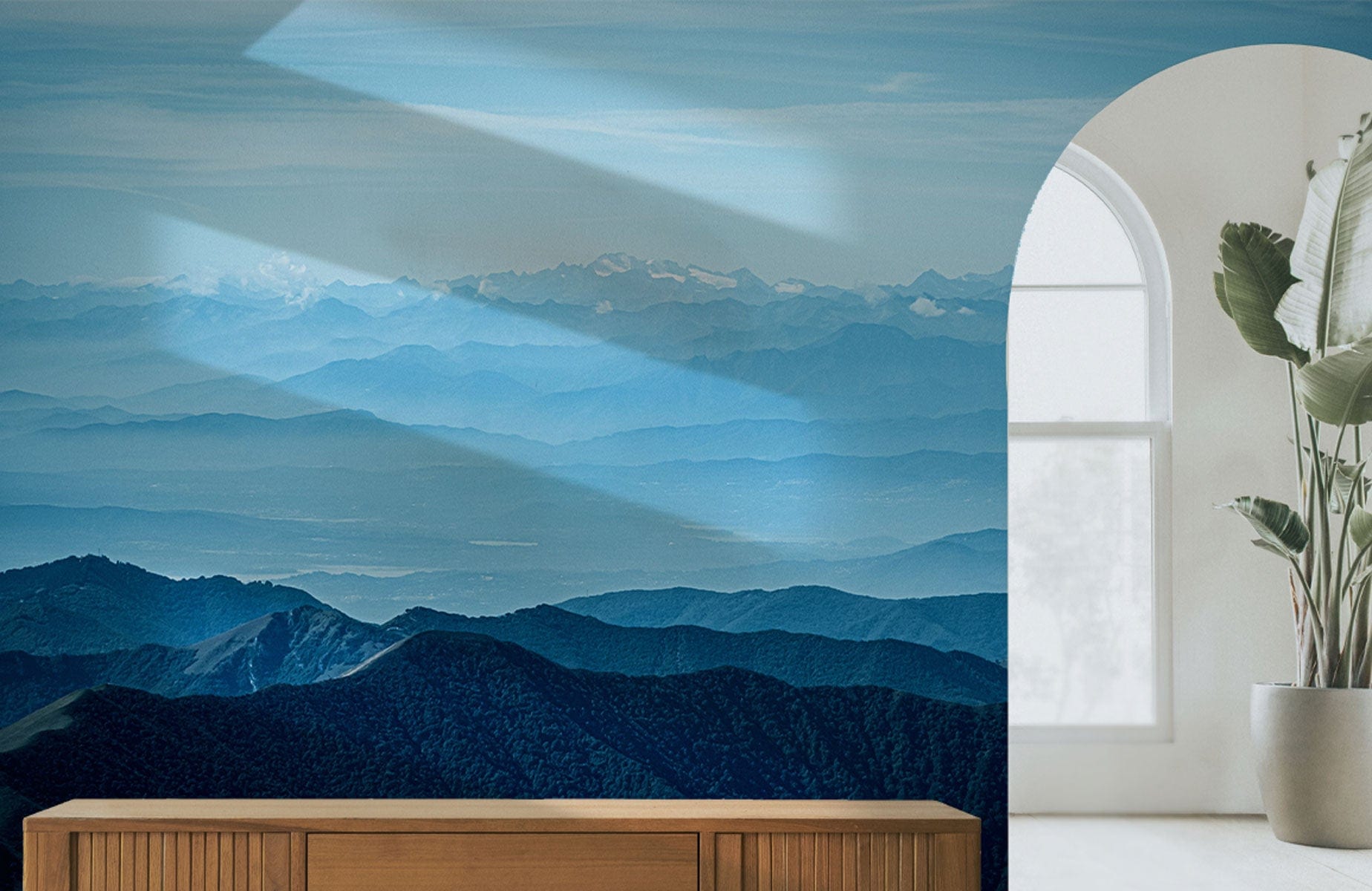 Wallpaper mural depicting the misty Rocky Mountains, perfect for use as a hallway decoration