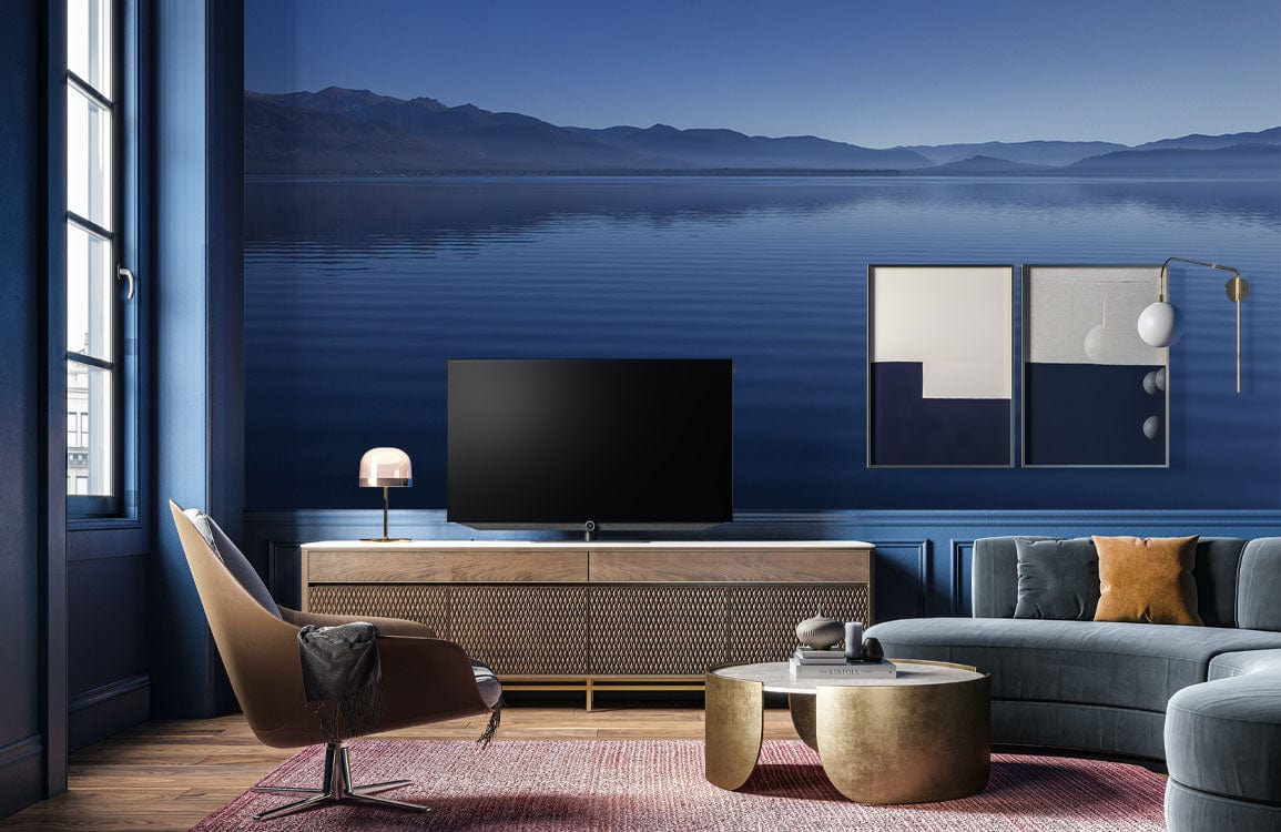 Wallpaper mural featuring tranquil lake scenery for the living room's decor.