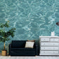 Wallpaper mural featuring turquoise ocean waves for use in decorating the living room