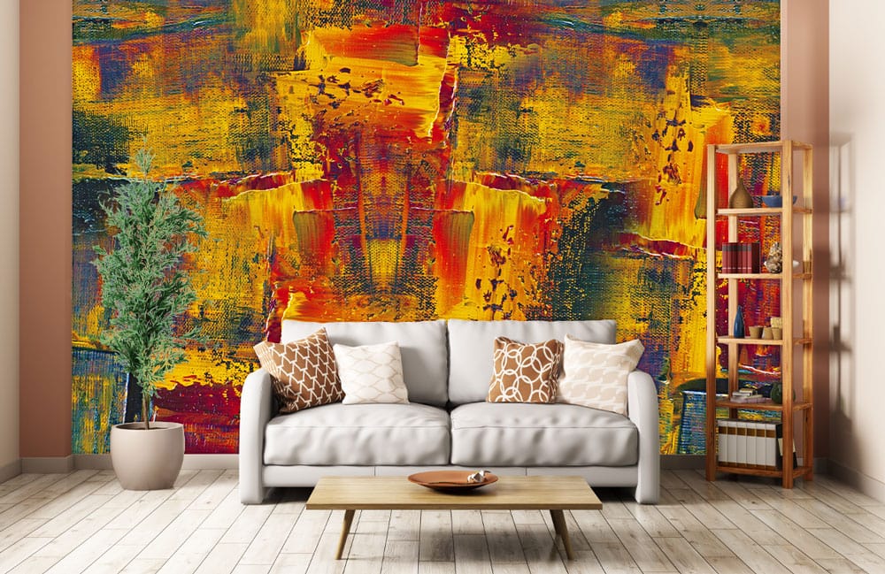 Decorate your living room with a mural including wild colours of paint and wallpaper.