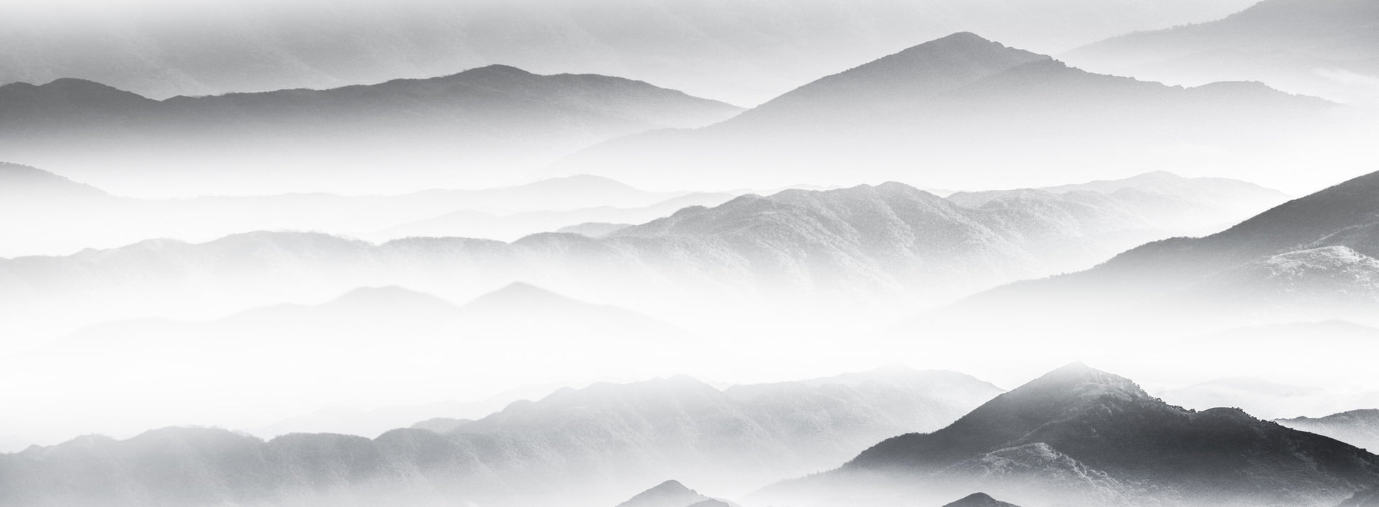 Mural of a foggy mountain landscape for use as interior design.