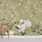wall paintings with birds and flowers adorning the branches of a tree