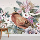 wall murals of a lovely bird perched on a branch of flowers