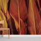 Wallpaper mural in the room featuring orange and red harvest leaves