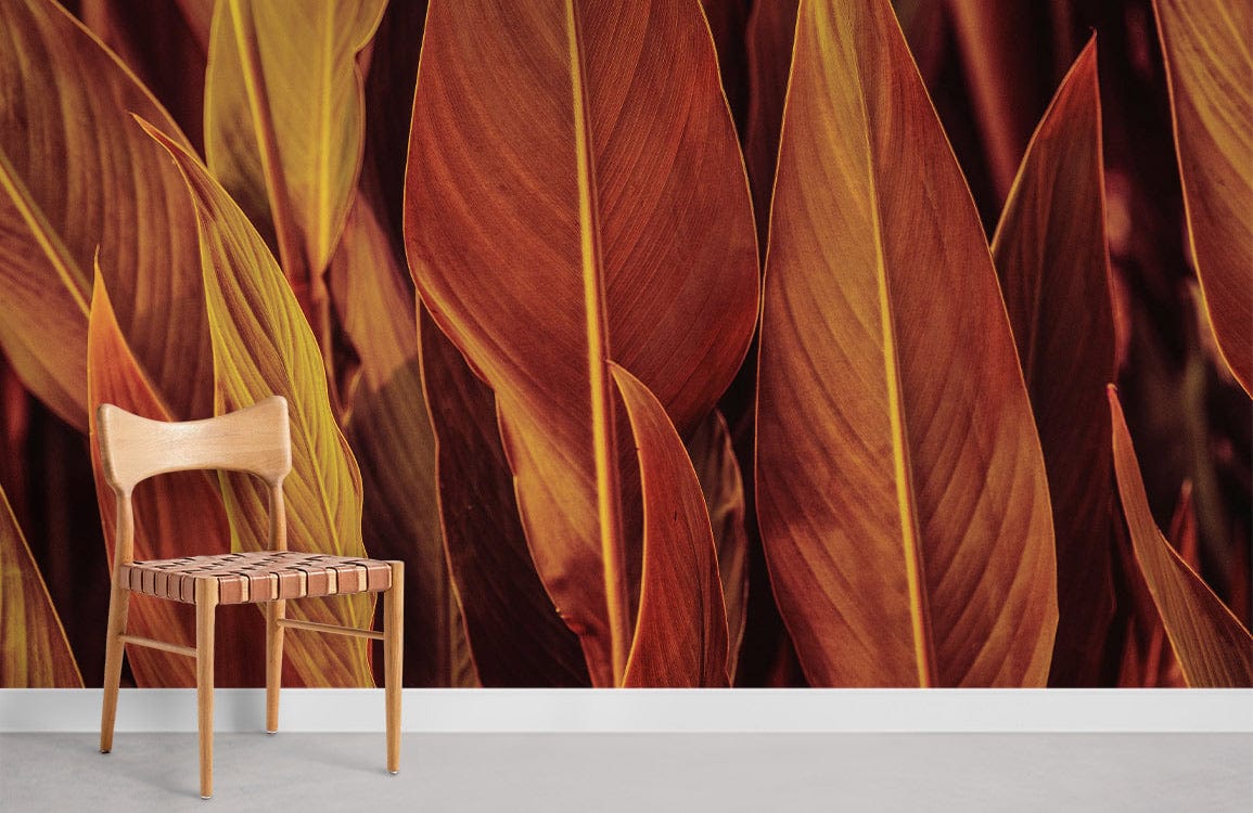 Wallpaper mural in the room featuring orange and red harvest leaves