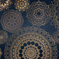 wallpaper with a fascinating golden Mandala pattern