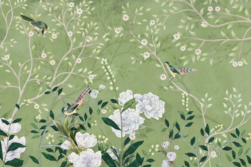 blossoms on branches and big floral wall paintings adorn the green backdrop.