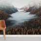 The Dolomites are depicted on the room's wallpaper in a mountainous forest mural.