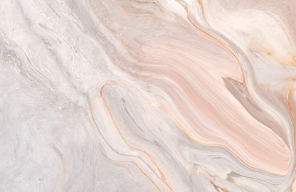Wallpaper mural for the home decorated in a pastel pink marble pattern.