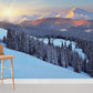 snowy forest and mountains under gold sunshine wall murals for room