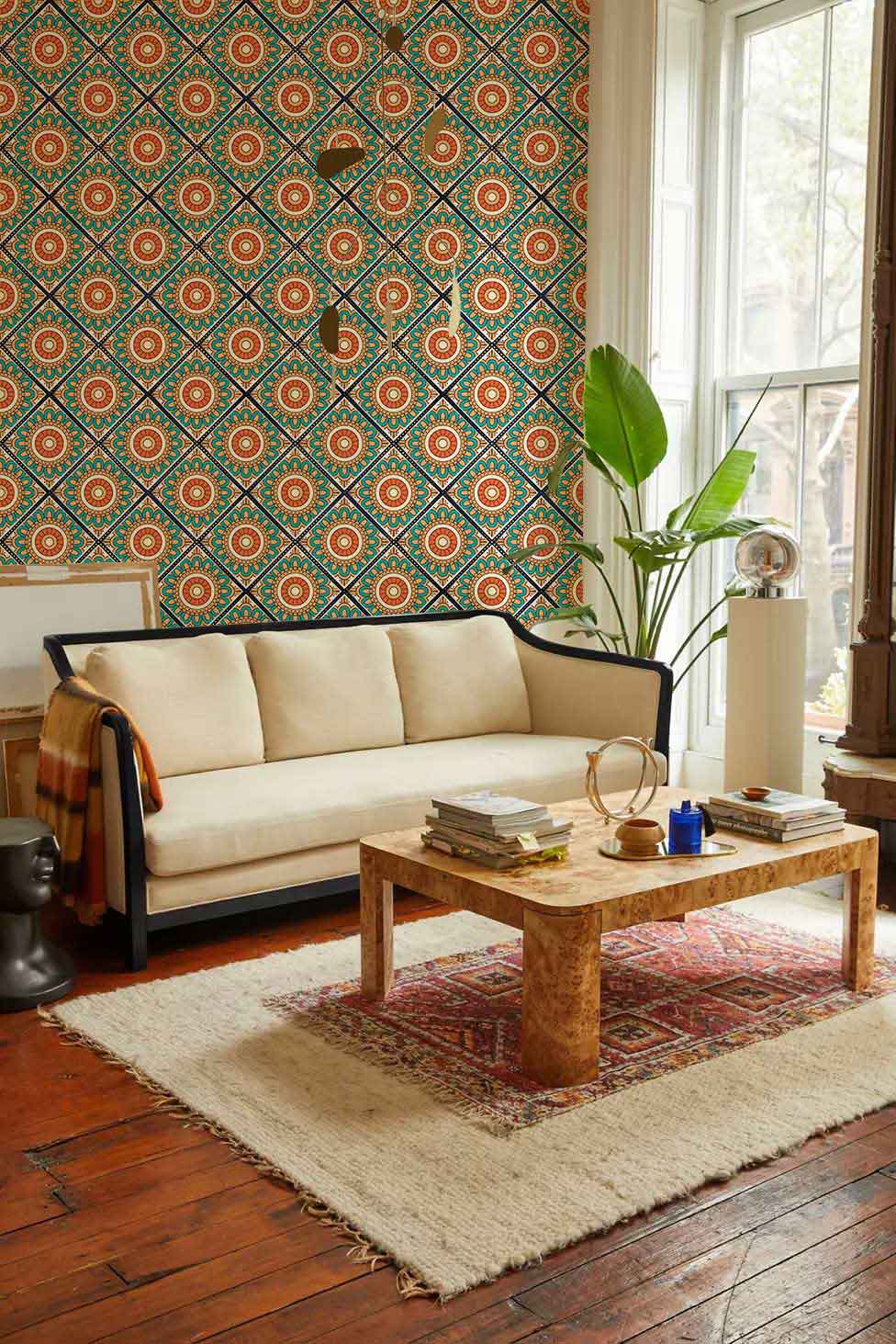 mural with repeating patterns of green and orange in a living room
