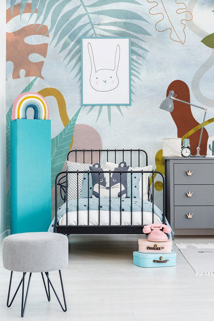 Wallpaper mural with an abstract design of colourful leaves, ideal for use in decorating children's rooms
