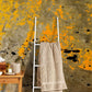 Wallpaper mural featuring an aged yellow paint finish, perfect for use in the bathroom.