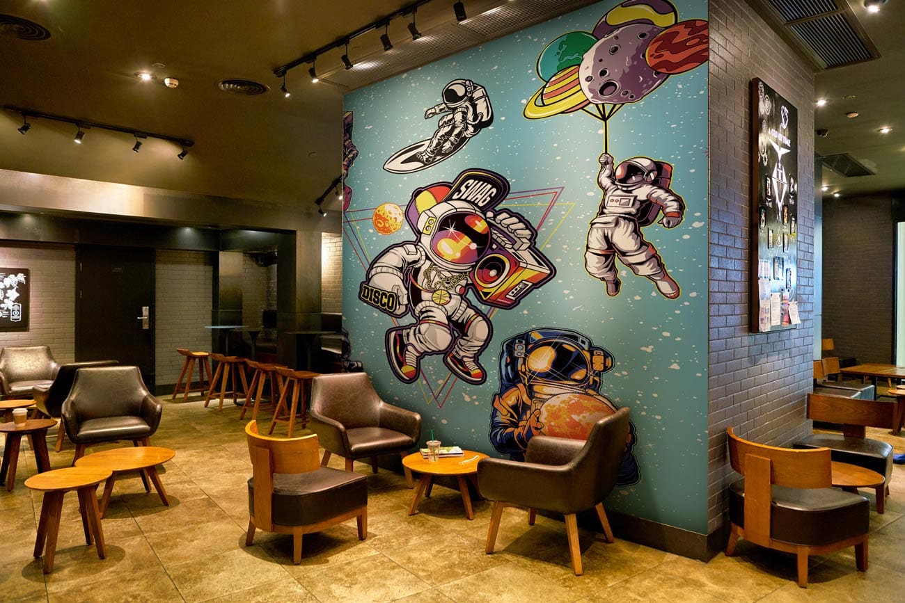 swag astronaut in planets mural design for restaurant