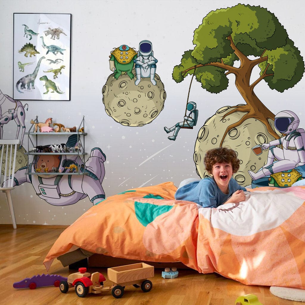 several astronauts playing in outer space mural design bedroom