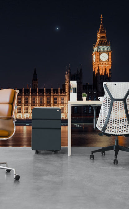 Wallpaper mural featuring a nighttime scene of Big Ben for use in decorating an office.