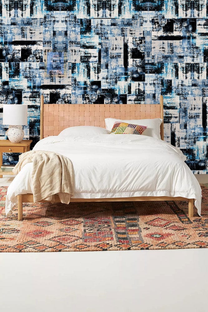 Wallpaper mural with black and blue squares, perfect for use as bedroom decor.