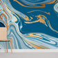 Mural wallpaper in the room featuring a blue abstract marble design.