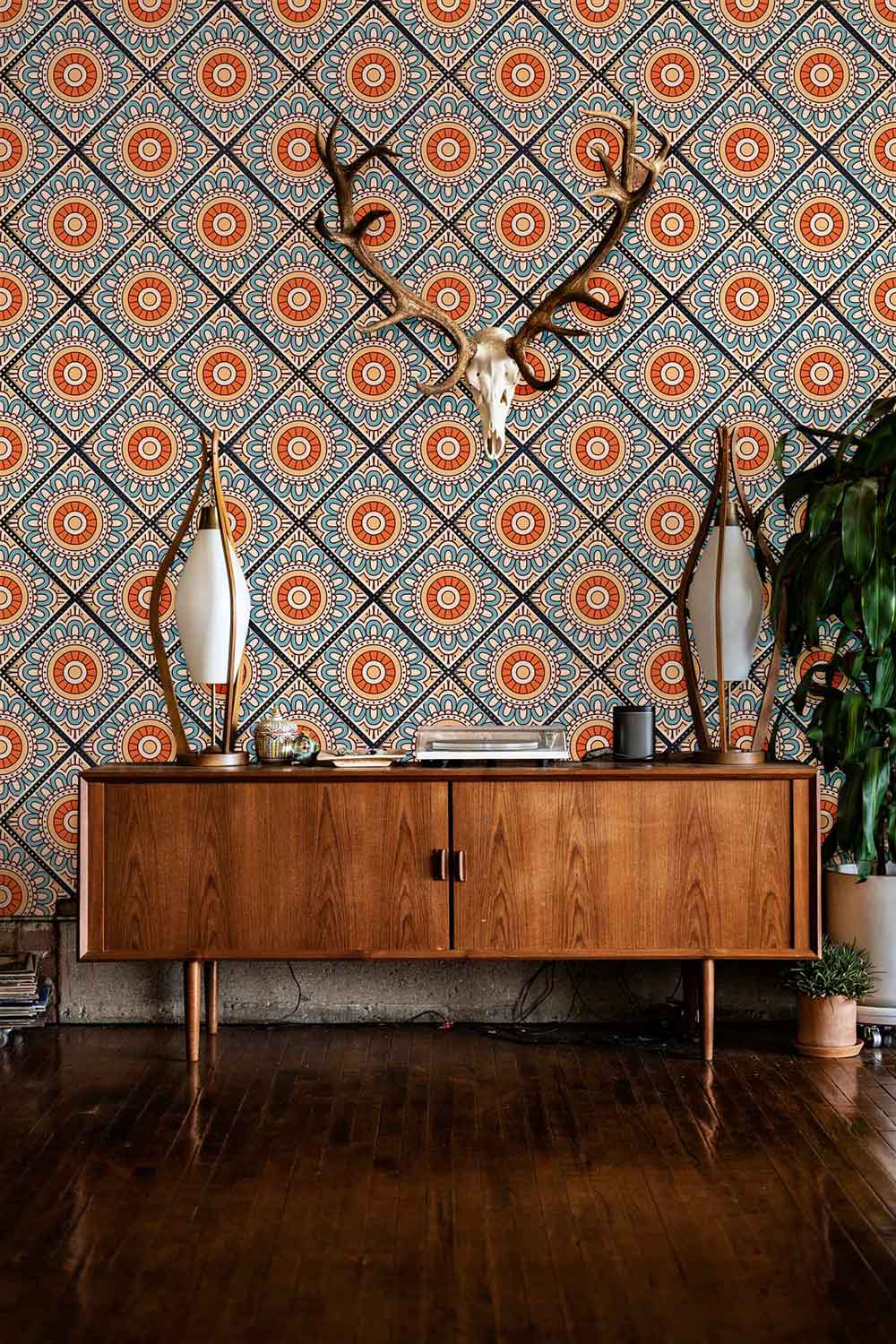 A blue wallpaper mural with repeating orange flower motifs is ideal for the hallway.