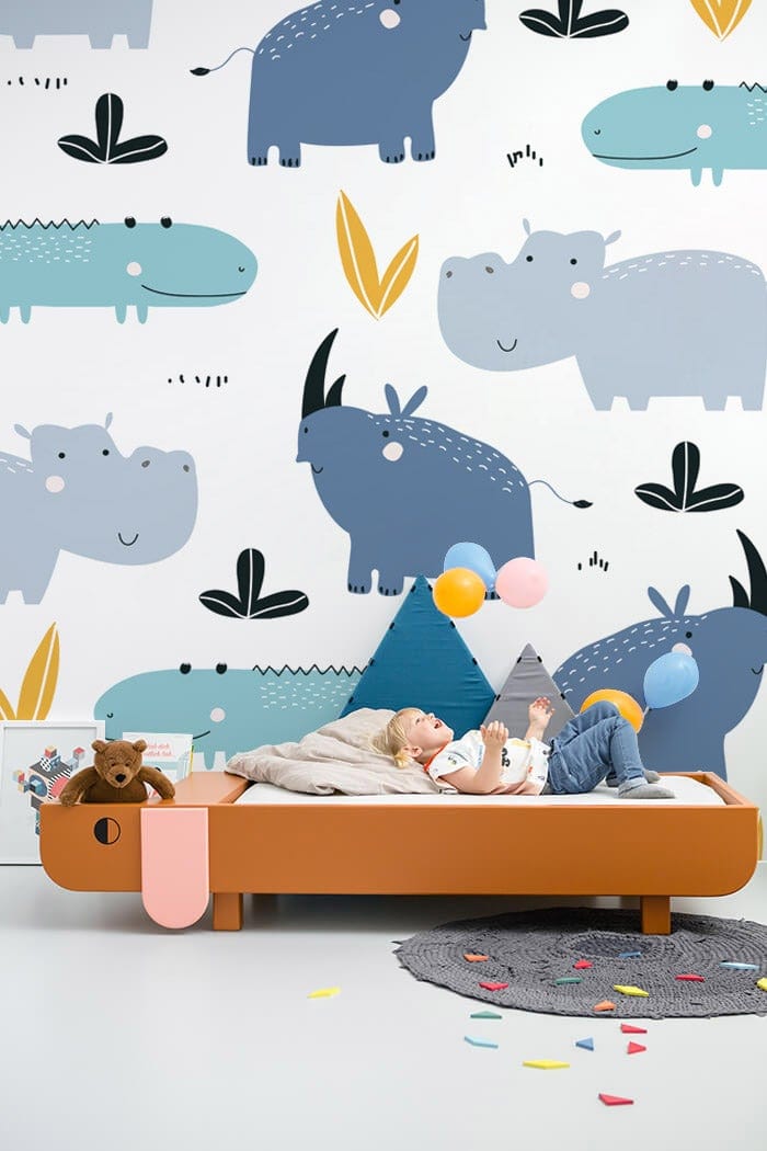 Wallpaper mural with Hippos and Crocodiles in Blue for Use as Bedroom Decoration