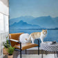 Wallpaper mural featuring a lake and mountains in blue for use in decorating the hallway
