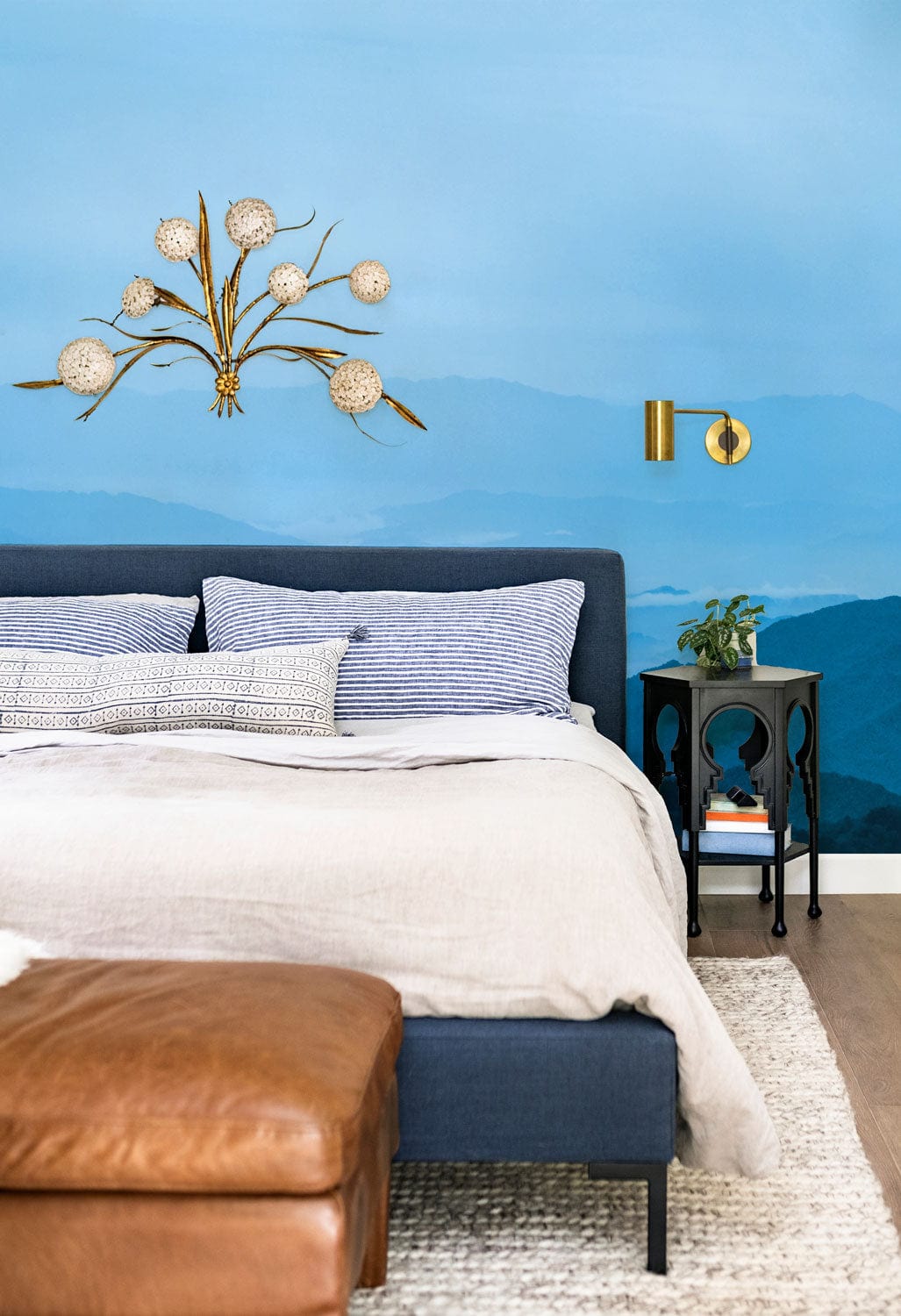 Wallpaper mural with a blue misty hillstops scene, ideal for use as bedroom decor