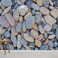 Wallpaper mural with blue pebbles, perfect for use in home decor