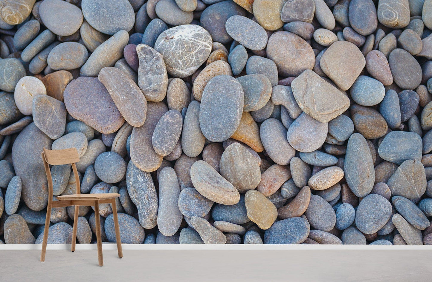 Wallpaper mural with blue pebbles, perfect for use in home decor