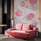 Wallpaper mural featuring a bright pink lotus flower that can be used to decorate the living room.