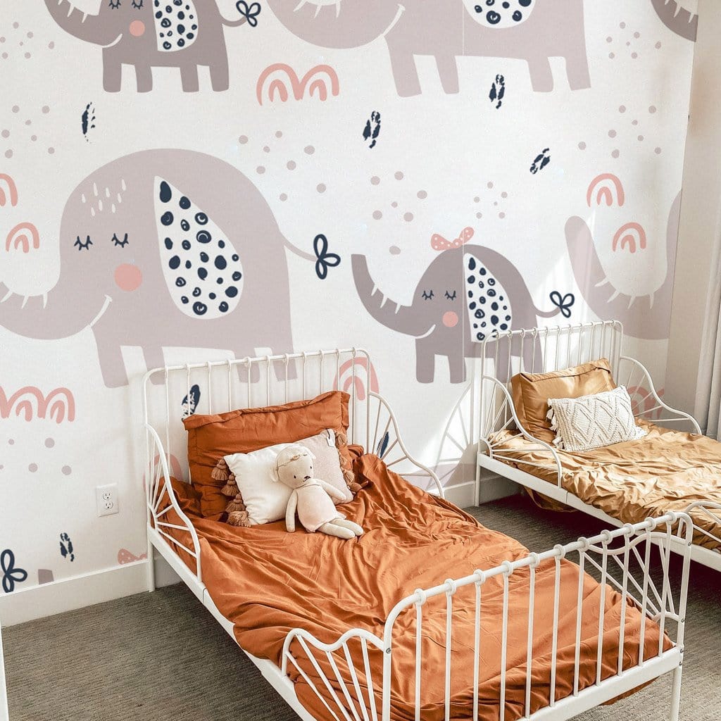 Wallpaper mural featuring a cartoon elephant in pastel colours, ideal for use as a bedroom decoration
