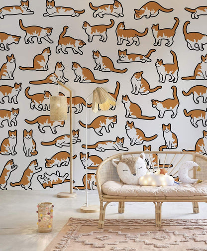 Playful Orange Cat Pattern Mural Wallpaper in playroom
