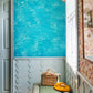 Wallpaper mural depicting a clear blue pool for use in decorating the hallway