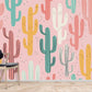 Wallpaper mural with colourful cactuses for use in interior design.