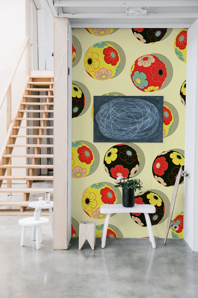 Wallpaper mural with a colourful embroidery ball design that can be used to decorate hallways.