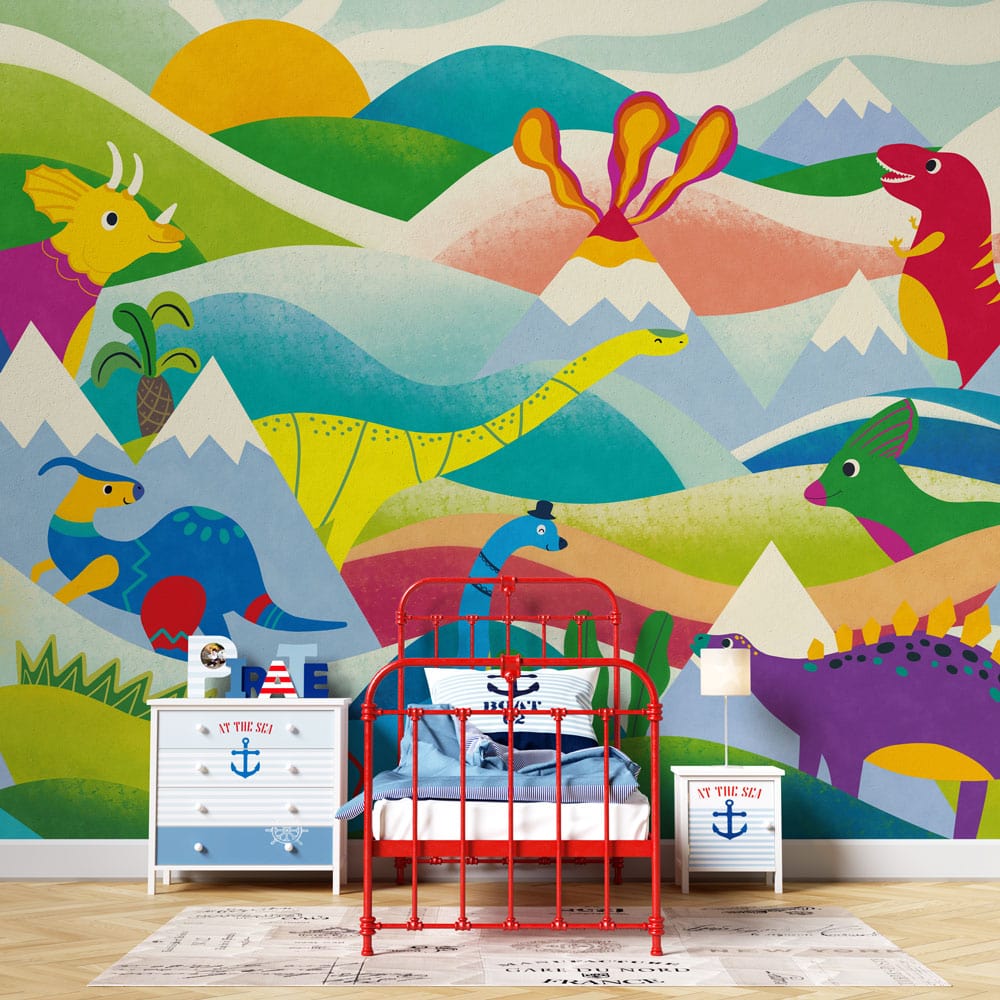 Wallpaper mural featuring colourful mountains and dinosaurs, perfect for use as a decoration in a nursery.
