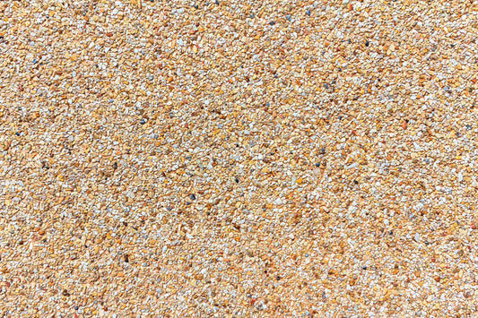 Wallpaper mural with colourful pebbles for use as home decor.