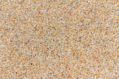 Wallpaper mural with colourful pebbles for use as home decor.
